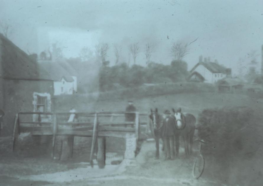 Old footbridge over ford and horses coming from Yond Hill
