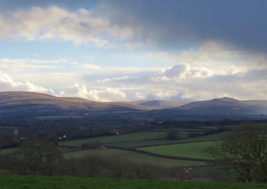 Cloudy skies looking from the Village towards Dartmoor