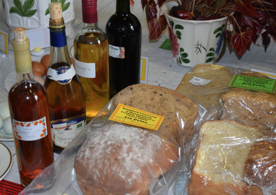 Produce exhibits showing wines and bread