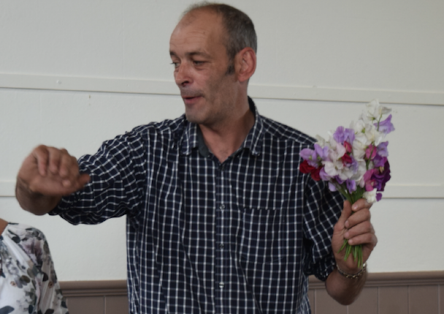 Robert Pyle auctioning some of the produce 2017