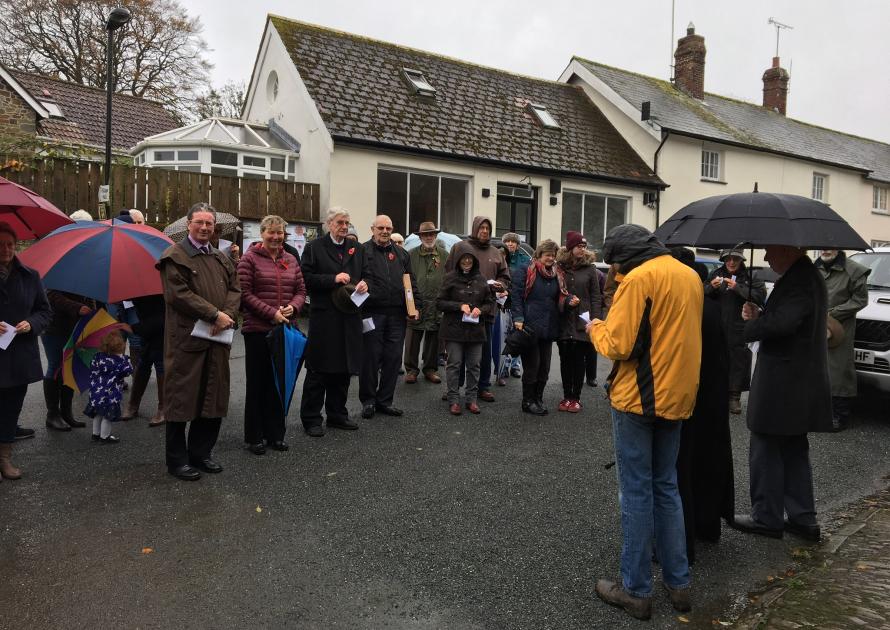 Crowd stood for 2 minutes silence