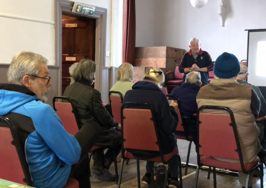 Parishioners listening to a talk on energy in the home.