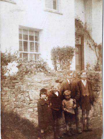 Snell family in road outside of Middletown