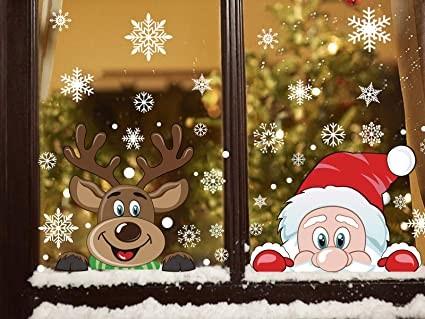 Image of cartoon Rudolph and Santa peeping over a window ledge