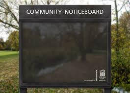 Picture of black notice board in a park