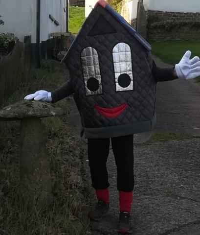 Roof-us standing by a staddle stone