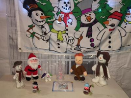 Picture showing drawings of snowmen and Father Christmas
