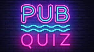 Pub Quiz sign lit up in neon colours pink and blue
