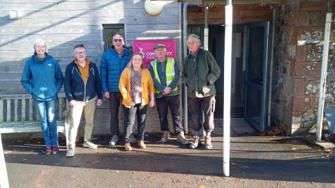 Members of the village hall committee with the National Lottery representative