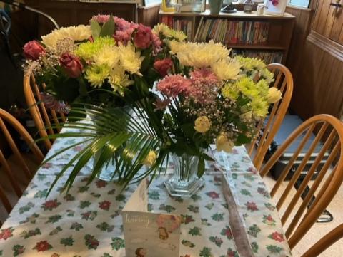 Bouquet of mixed flowers standing in a vase