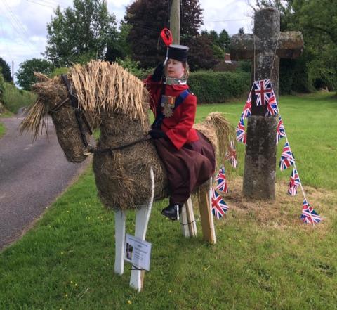 Scarecrow of "Queen Elizabeth" on her horse