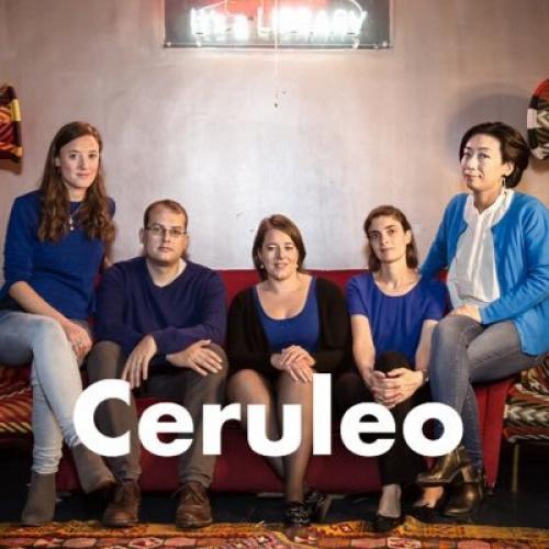 Picture of the members of Ceruleo sitting on a sofa