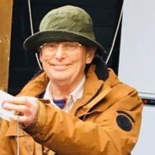 Photo of Charlie holding a conker