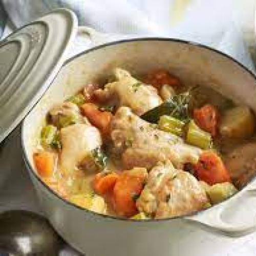 Picture of a chicken casserole in a white dish