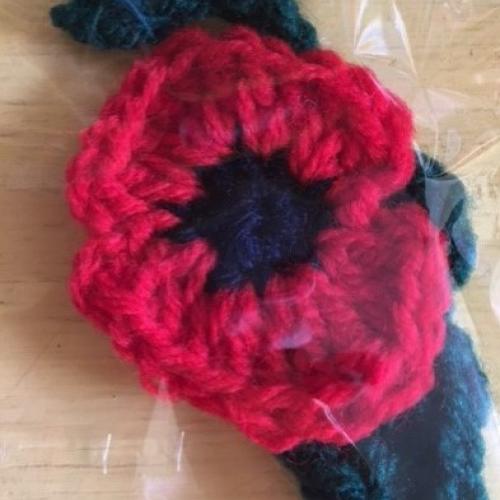 knitted poppy in red and black